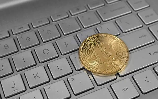Bitcoin on Laptop Keyboard